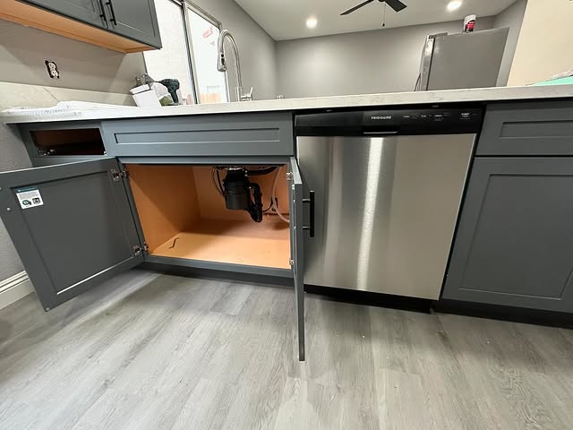 Commercial kitchen plumbing work with garbage disposal and dishwasher hookup